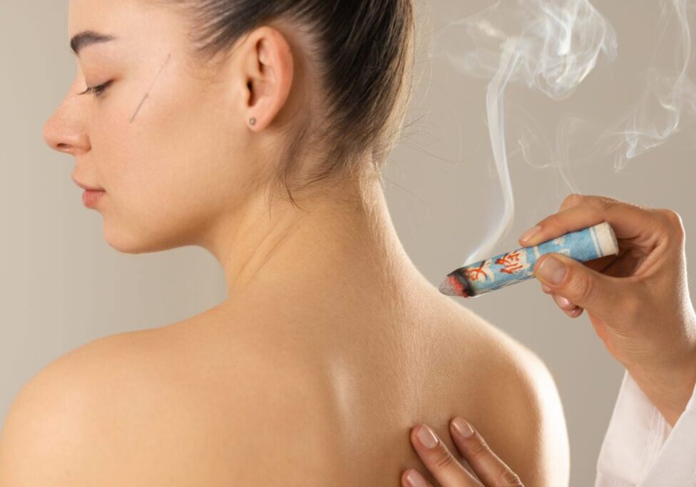 A person receiving a smoking therapy treatment on their back.